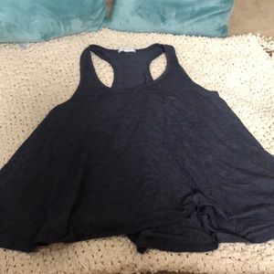 Delia’s flowy navy blue tank top with pocket